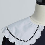 Scalloped Hem Flare Tricot Top
